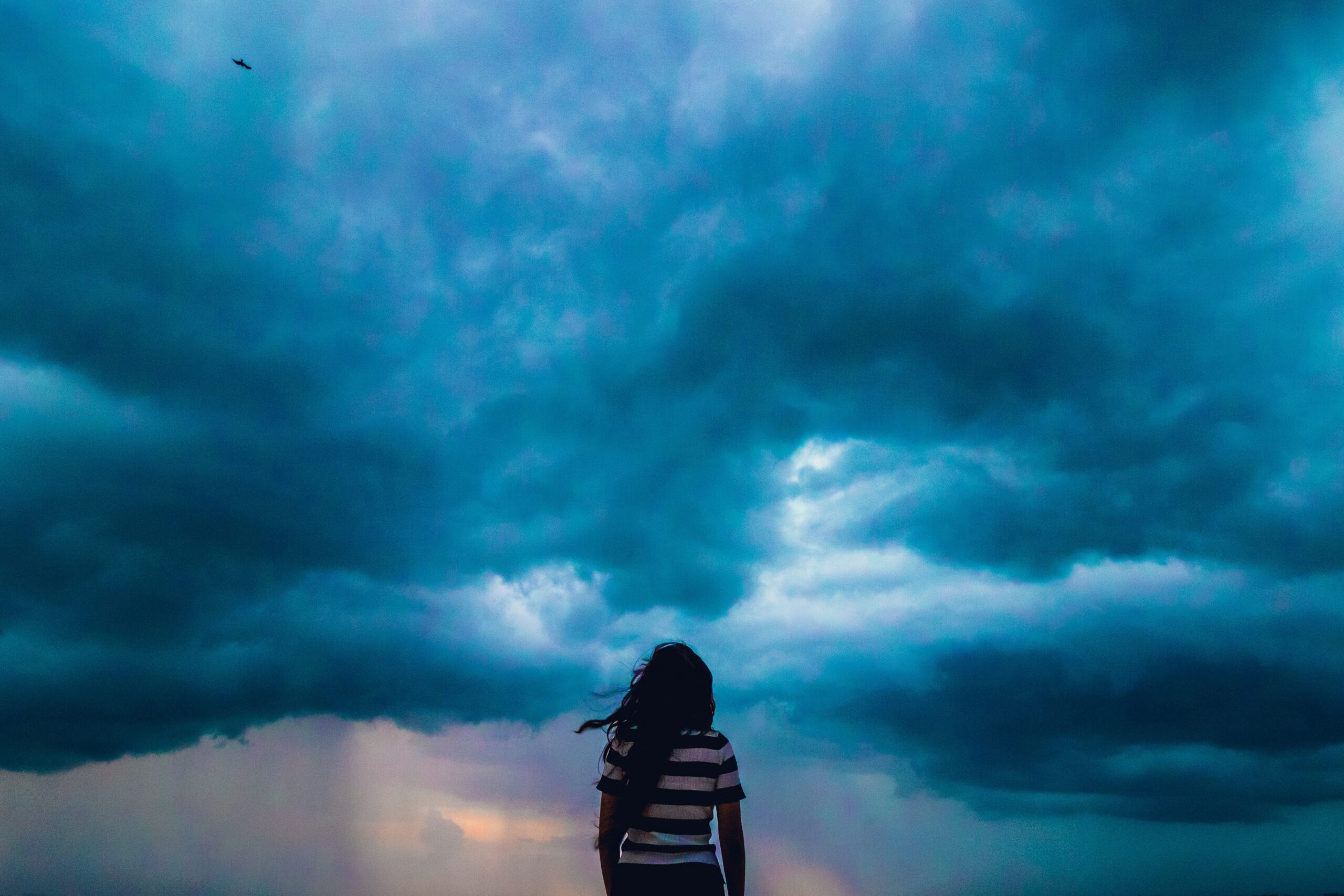 woman looking at a storm